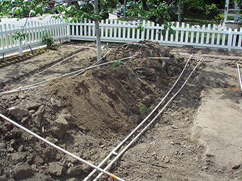 Digging new trenches for the irrigation system